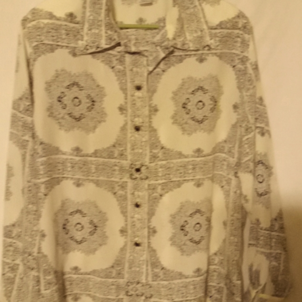 Ladies button down blouse size 12 .100%Polyester black &white